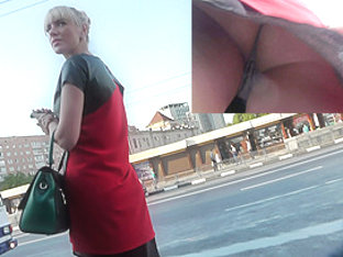 Public Upskirt Of The Blonde Dame At The Bus Station