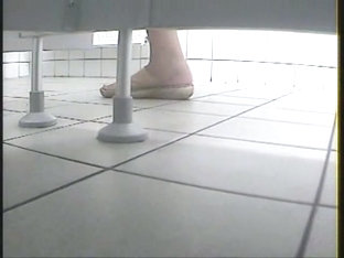 Women's toilet pissing spy cam video starring several ladies