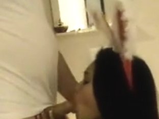 Oriental hottie awards santa with a fellatio