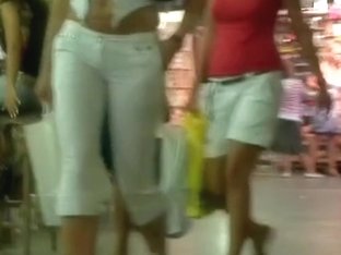 Alluring Girl Walking Slowly In The Mall Candid