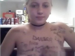 Ponytailed Blonde Girl Writes All Kinds Of Words On Her Naked Body In The Kitchen