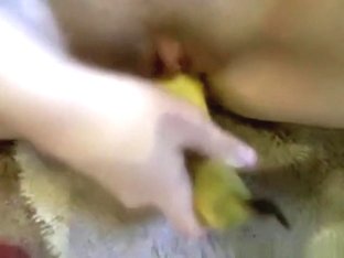 Girl Wildly Masturbates With A Banana On The Floor And Moans