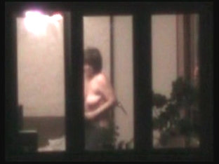 Naked Woman In Window