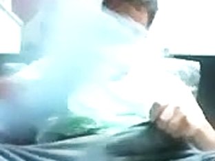 Nice poof is relaxing in a small room and memorializing himself on computer webcam