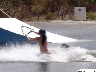 Sweethearts take off their bikinis and try out wakeboarding by the lake