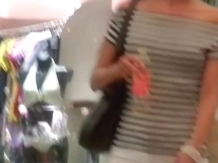 fantastic ass caught in the shop on hidden camera