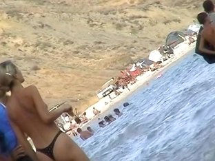 Spycam On Beach Records Amateurs Topless And Also Nude