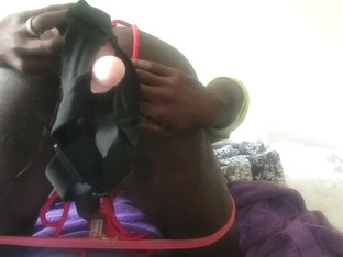 Crossdresser sucks and rides strap on alone while roped