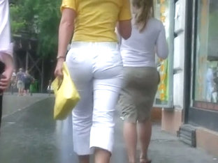 Classy Blonde In Heels And White Pants In A Street Candid Vid