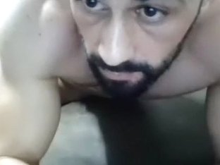 Sexy man is relaxing in a small room and memorializing himself on camera