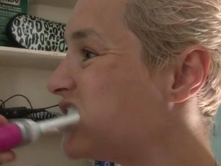 Aussie blonde masturbates with a tootbrush