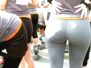 a woman in leggings with big round butt