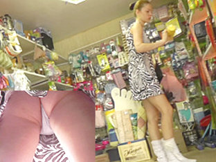 Babe filmed by spy upskirt camera in the local store