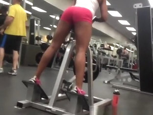 Woman In Tight Pink Sports Shorts