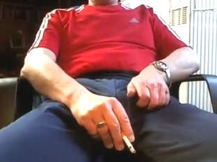 Smoke and drink in shiny trackies