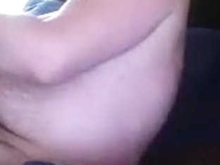 Nice-looking dude is having a good time in a small room and filming himself on webcam