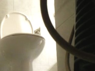 Pissing Girl Gets Caught On A Hidden Cam In The Bathroom