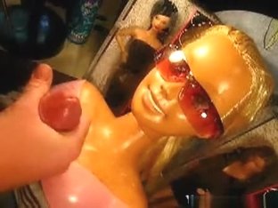 Crazy Guy Gives His Gf's Barbie's A Facial Cumshot