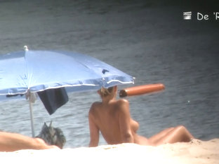 Voyeur webcam catches amateurs nude and half nude on beach