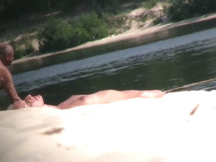 Hot nude blonde sunbathing filmed by hidden beach camera