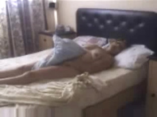 Hidden cam catches my mum masturbating on bed