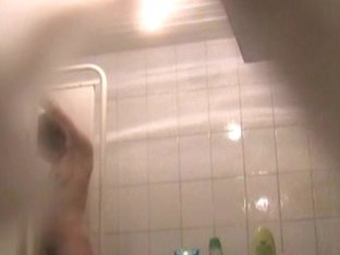 Good-looking Woman Thinks That She Is Alone In The Shower