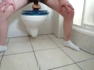 Riding A Huge Dildo In The Bathroom