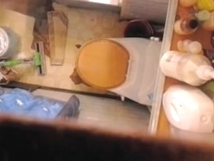 Girl Stalked By Voyeur Cam In Toilet