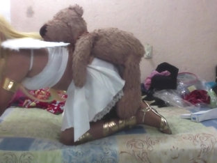 sexy angel fucked by a teddy bear and dildo