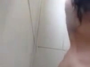 latina girl with nice booty taking a shower
