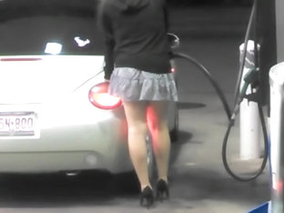 Luxurious babe on the gas station