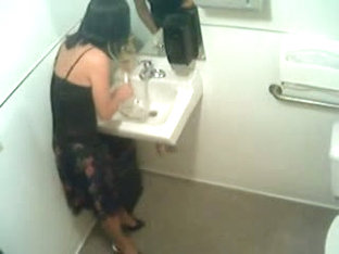 Toilet Voyeur With Brunette