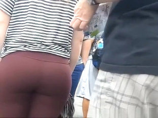 Big ass teen in dark red leggings