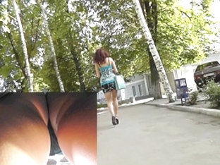 Delightful brunette hair in outdoor upskirt vid