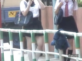 Asian teens have their panties down during street sharking.