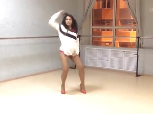 Girl in extremly short dress and high heels dancing