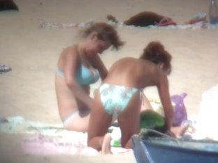 Ladies With Appetizing Breasts Have A Good Time On The Beach