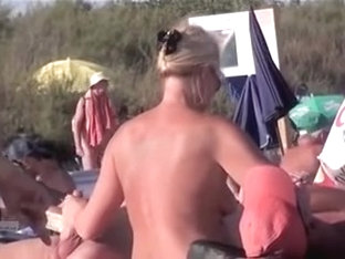 French Naturist Woman Strokes Cocks Of Two Men On Nudist Beach