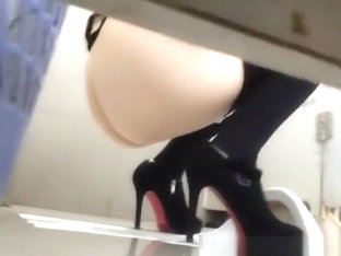 Woman In High Heels Caught In Public Toilet Pissing