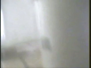 Toilet voyeur video of a hot slim blonde pissing