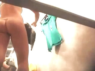 Woman Is Taking Her Clothes Off In A Fitting Room