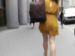 Woman In Short Yellow Dress