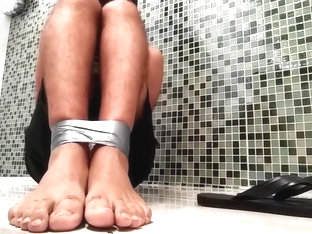 hot guy in shorts n flip flops is bound gagged n blindfolded