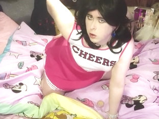 Sissy cheerleader poses and gives herself a facial