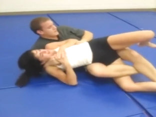 Hot Woman Is Dominated By Fat Man. Mixed Wrestling