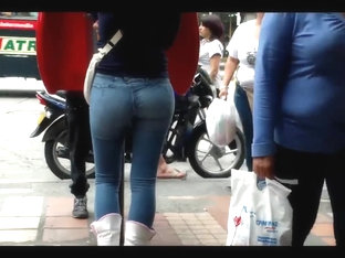 A Beautiful Round Ass In Jeans Talking At A Public Phone