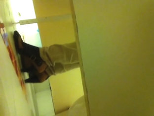 Nothing but legs in heeled shoes on toilet pissing movie