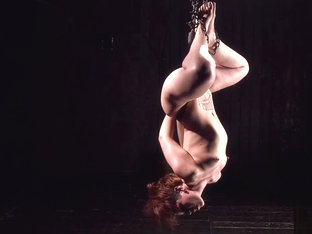 Chained And Suspended Redhead Whipped