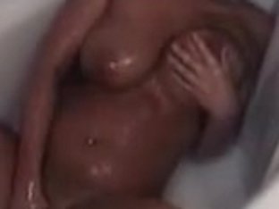 Breasty Leslie Playing Her Vagina In The Bathtub