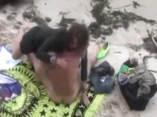 Voyeur Tapes A Young Couple Having Sex On A Private Part Of The Beach